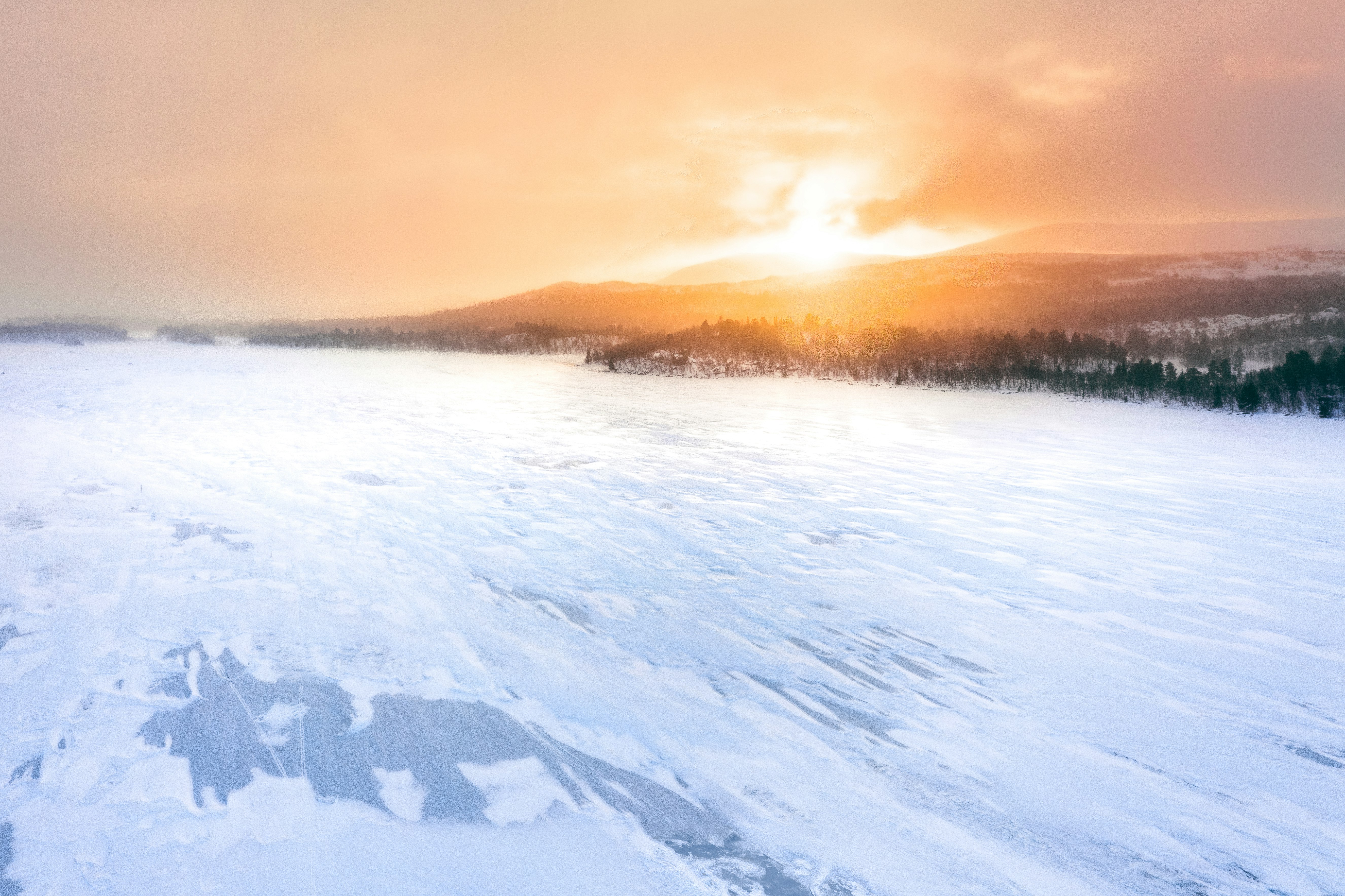 snow covered field during daytime